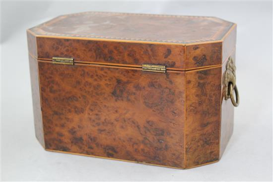 A Victorian birds eye yew elongated octagonal tea caddy, 8.5in.